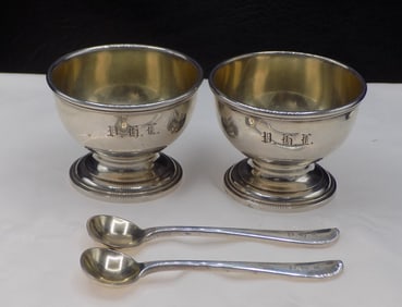 Pair of signed Tiffany sterling silver salt dips with spoons