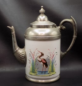 Charming antique enamel decorated pewter coffee pot with stork