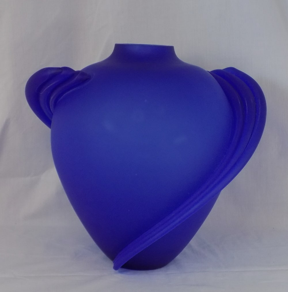 Marvelous midcentury modern deep blue art glass vase.: Marvelous midcentury modern deep blue art glass vase. Beautiful colors and unique design. Great quality and detail. In very good original as found condition. 12 inches tall x 13 inches wide