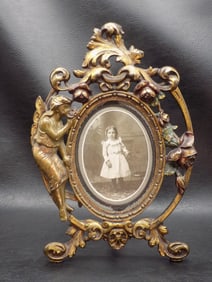 Fancy Art Nouveau figural picture frame.