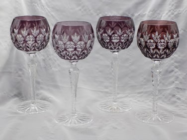 Beautiful set of four vintage purple to clear cut glass wine glasses.