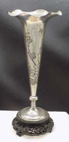 Antique silverplate floral decorated vase.