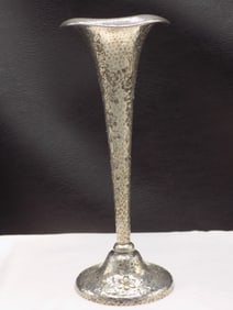 Fancy antique floral decorated sterling silver vase
