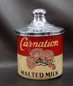 Large vintage Carnation Malted Milk advertising metal container