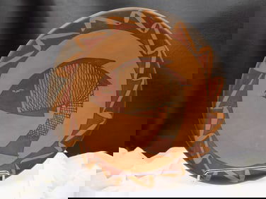 Vintage Native American Indian style decorated plate with fish.