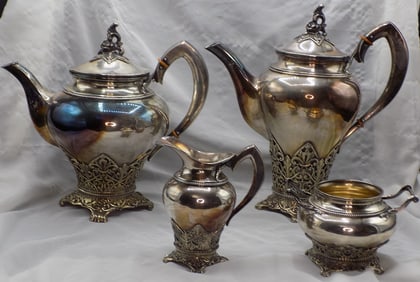 Vintage German decorated sterling silver four piece tea set
