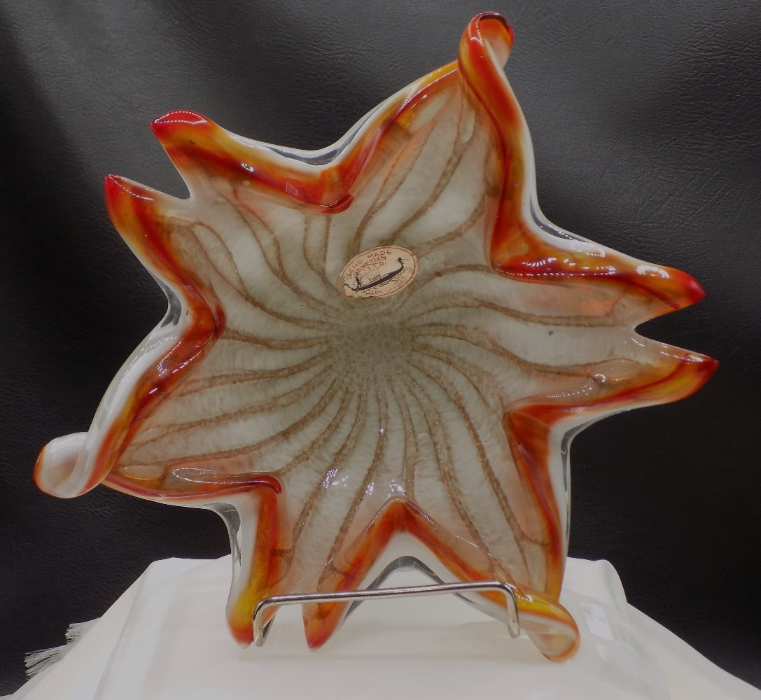 Midcentury modern Murano art glass bowl.: Midcentury modern Murano art glass bowl. Original label Beautiful colors with lots of gold dust. Great quality and detail. In very good original as found condition. 9 ¼ wide x 2 7/8 inches tall