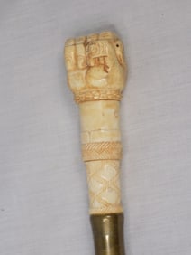 Unusual antique hand carved cane with fist holding snake