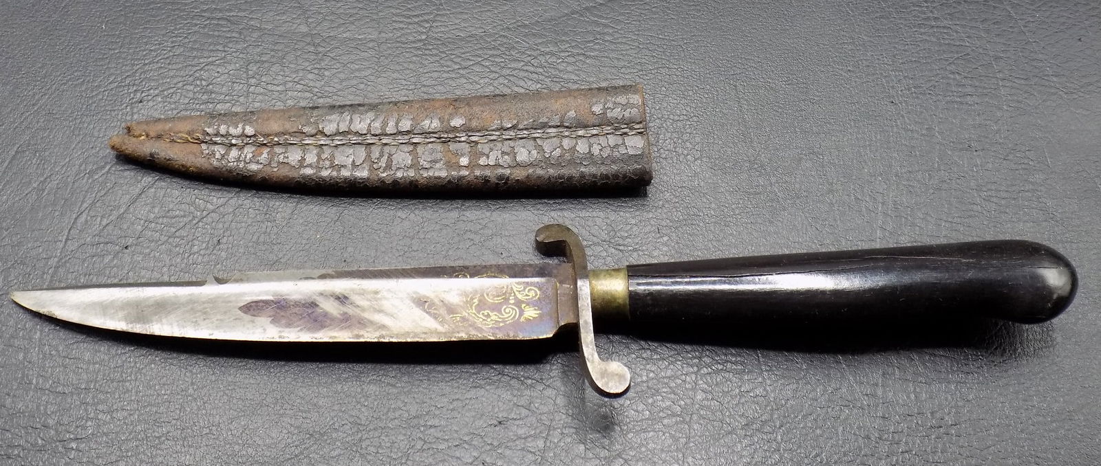Antique boot knife and sheath. (1 of 4)