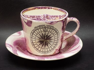 Unusual pink luster The Mariners Compass mustache cup and saucer.
