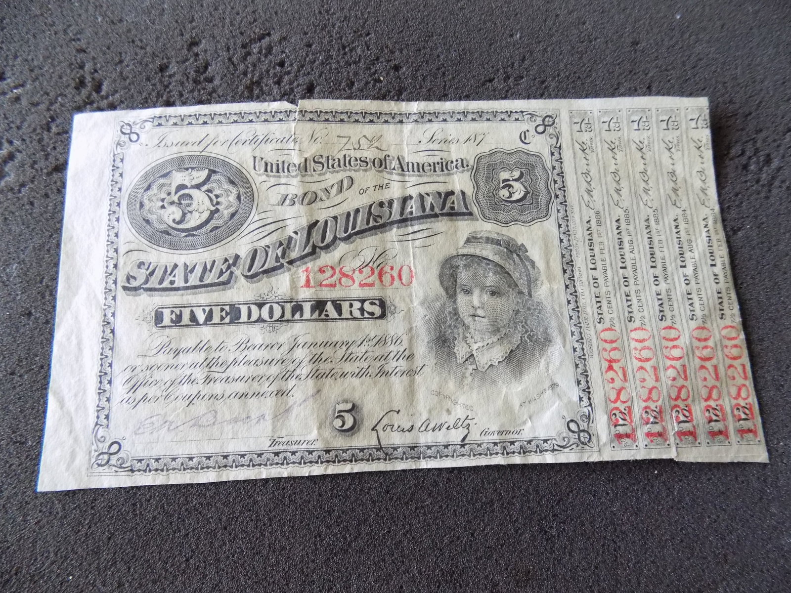 1879 $5 Five Dollar State of Louisiana Baby Bond: 1879 $5 Five Dollar State of Louisiana Baby Bond. Please seee photos.