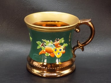 Vintage decorated copper luster cup with fruit