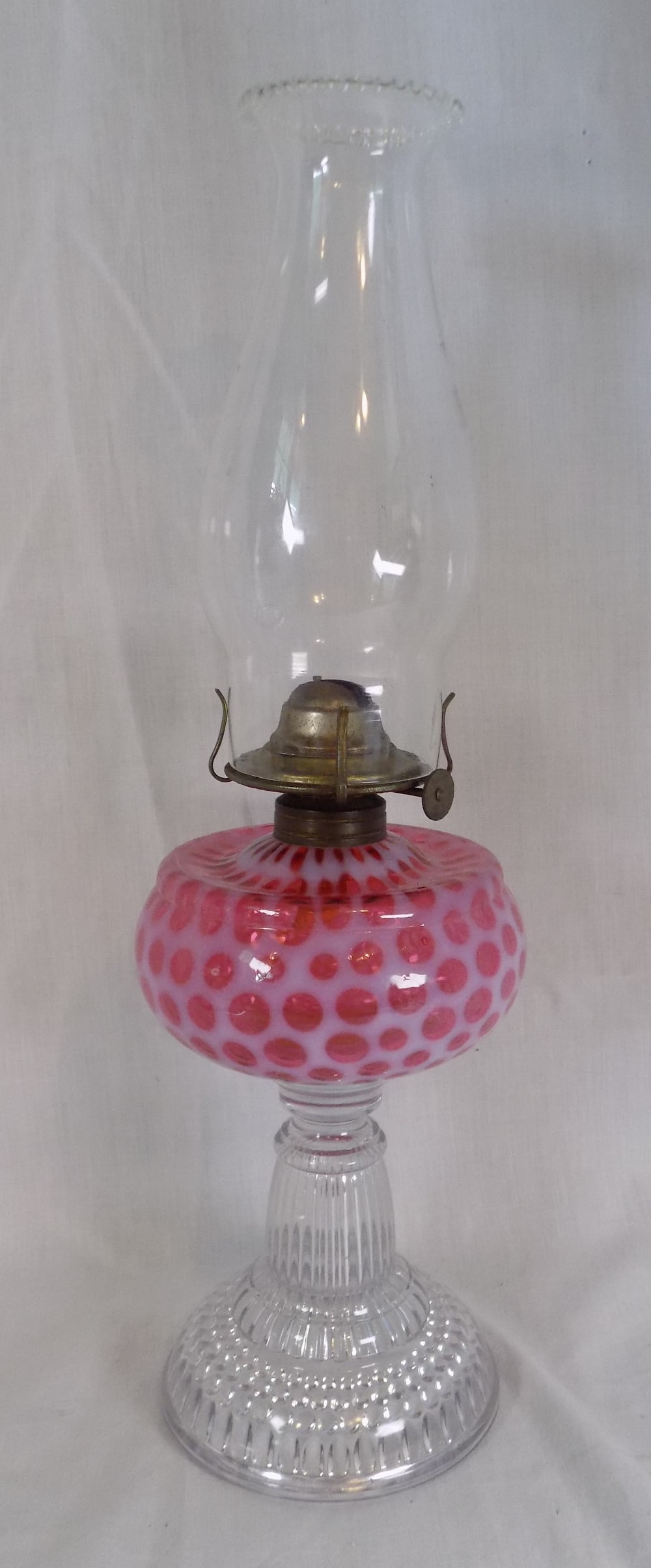 Antique cranberry white opalescent coin spot kerosene lamp. (1 of 5)