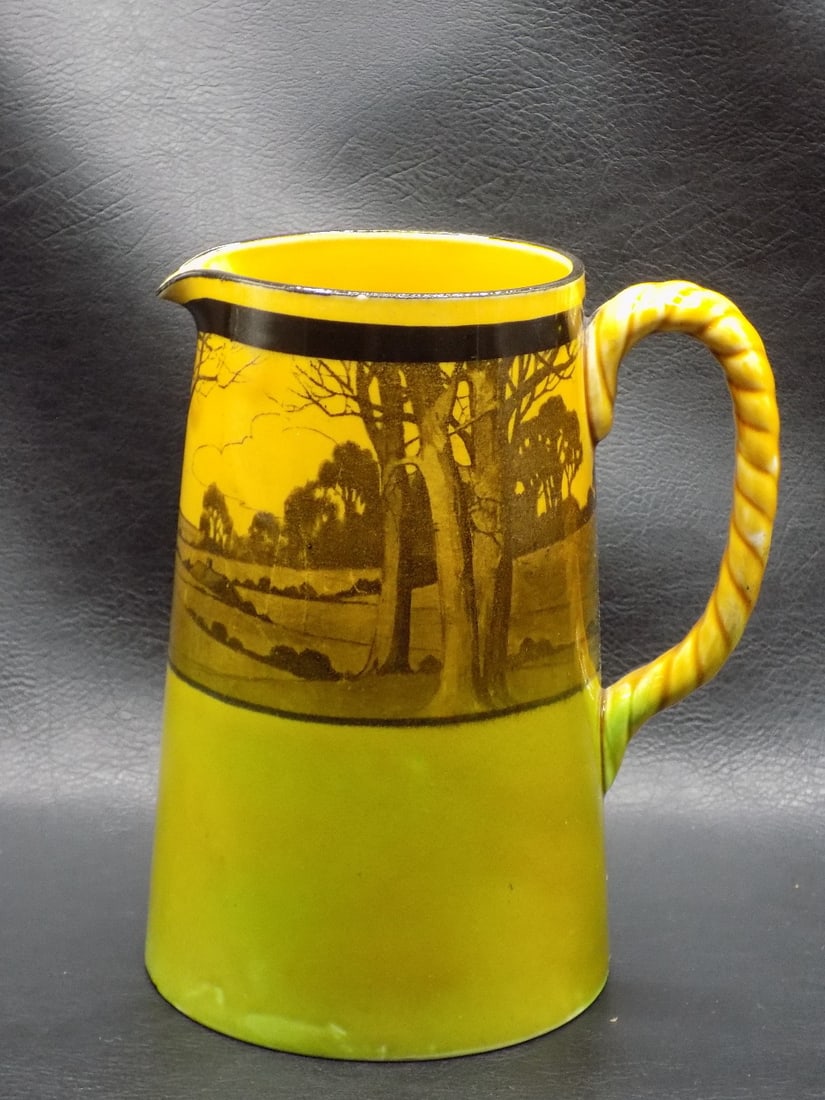 Vintage Royal Doulton Haystacks Woodland Series pitcher 1902-1922: Vintage Royal Doulton Haystacks Woodland Series pitcher 1902-1922. Marked on bottom as shown in photo. Beautiful colors. Great quality and detail. In very good original as found condition. 6 3/8 inche