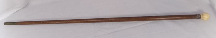 Antique cane with carved handle