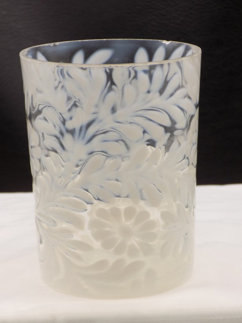 Vintage floral decorated white opalescent art glass tumbler: Vintage floral decorated white opalescent art glass tumbler. Beautiful colors. Great quality and detail. Has a small chip on rim as shown in photo. 3 5/8 inches tall x 2 7/8 wide at top rim.
