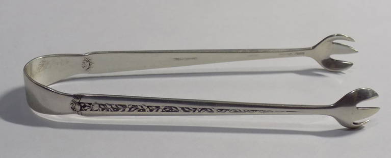 Towle Rambler Rose sterling silver sugar tongs: Towle Rambler Rose sterling silver sugar tongs. Marked as shown in photo. In very good original as found condition. Great quality and detail. 4 inches long. 20 grams. For in house shipping. Please cal