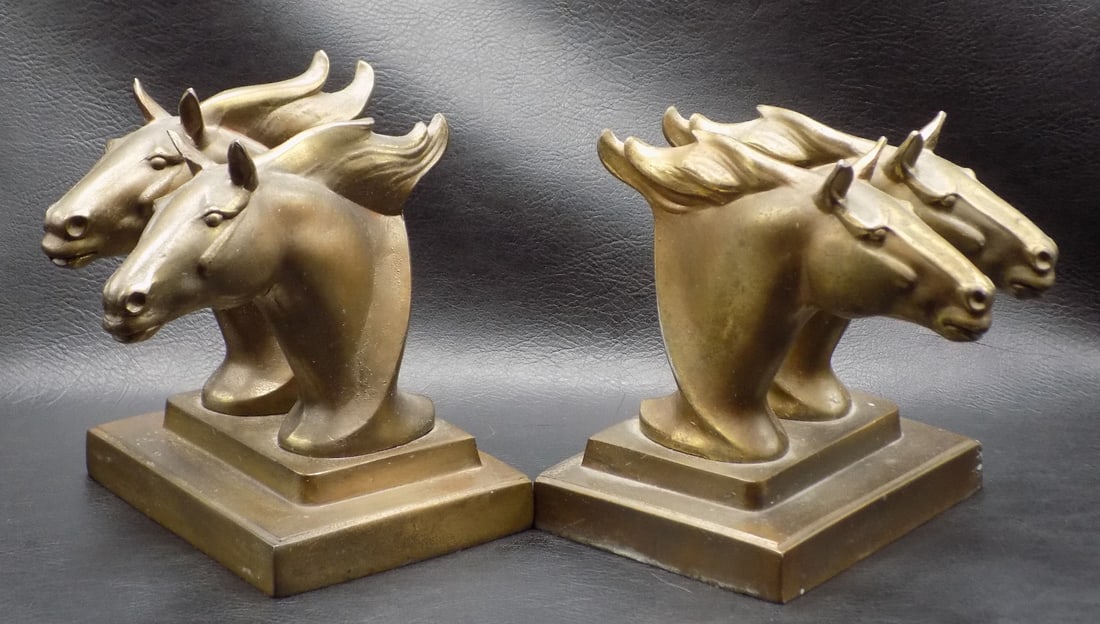 Horse book ends. Frankart: Vintage double horse head bookends. Marked Frankart on base as shown in photo. Spelter with original gold patina. In very good original as found condition. Great quality and detail. 5 ¼ tall at