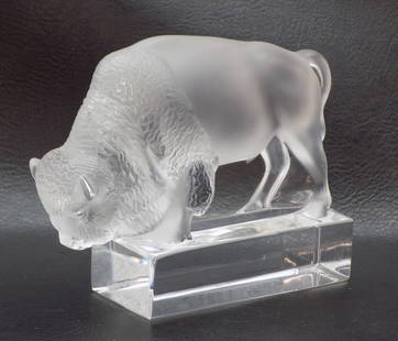 Signed Lalique art glass buffalo paperweight: Signed Lalique art glass buffalo paperweight. Marked and label on bottom as shown in photo. In very good original as found condition. Great quality and detail. 3 &frac34; tall x 4 7/8 long. For in hou
