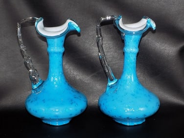 Lovely vintage pair of art glass ewers.