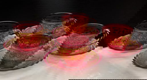 Great decorated cranberry Moser set of four cups and saucers