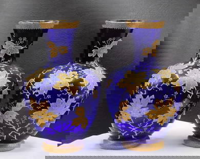 Highly decorated pair of antique enamel decorated blue art glass vases: Highly decorated pair of antique enamel decorated blue art glass vases. Marked on bottom as shown in photo. In very good original as found condition. Great quality and detail. 6 inches tall. For in ho