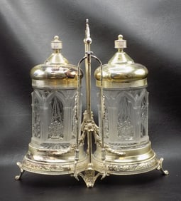 Splendid ornate double castor set.