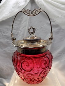 Victorian cranberry decorated art glass cracker or cookie jar.
