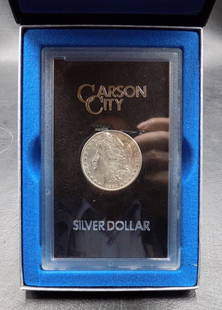 1884-Carson City GSA Morgan Silver Dollar Uncirculated with Box and COA: 1884-Carson City GSA Morgan Silver Dollar Uncirculated with Box and COA. Government issued. Please see photos. For in house shipping. Please call Mike at Thriftiques 319-321-0613.