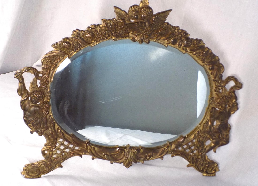Ornate antique cast iron beveled glass dressing mirror with angels (1 of 7)