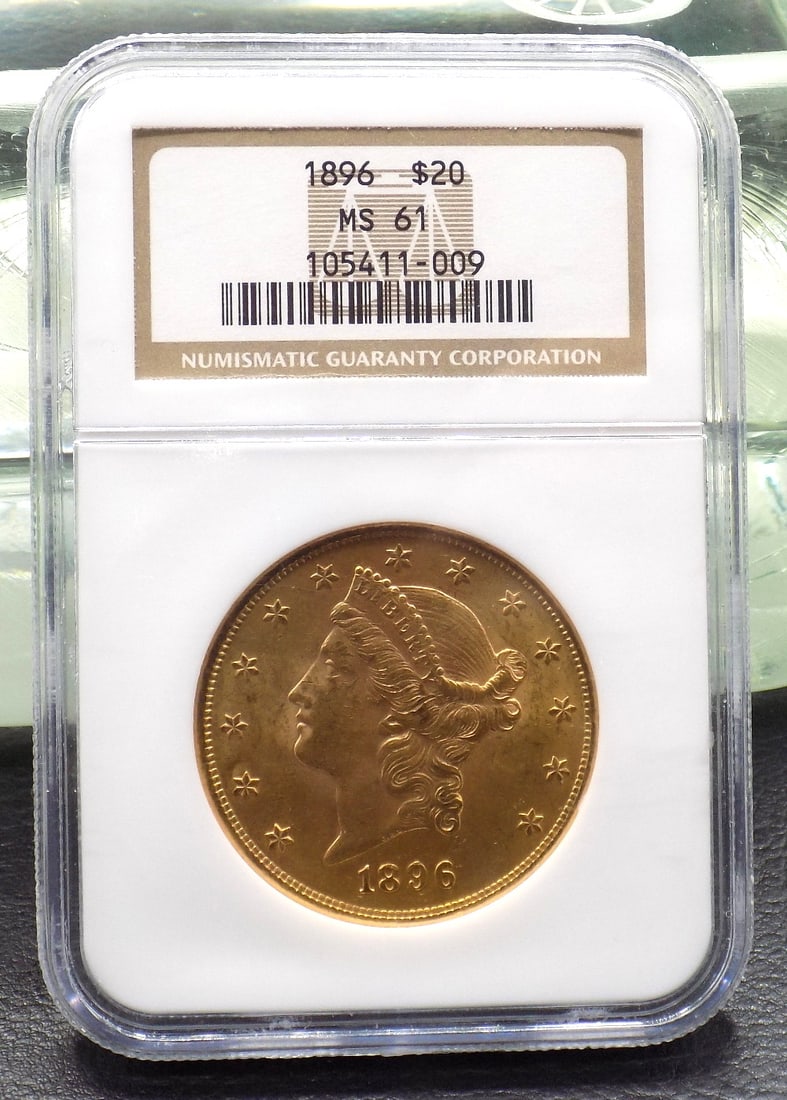 1896 $20 dollar MS61 graded by NGC gold coin.: 1896 $20 dollar MS61 graded by NGC gold coin. Please see photos. No credit cards for gold coins. Payment through Live Auctioneers or cashiers check. No shipping out of United States. For in house ship
