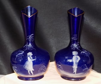 Charming pair of decorated cobalt blue art glass vases