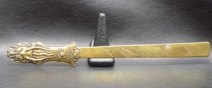 Fancy antique bronze page turner with dragon head
