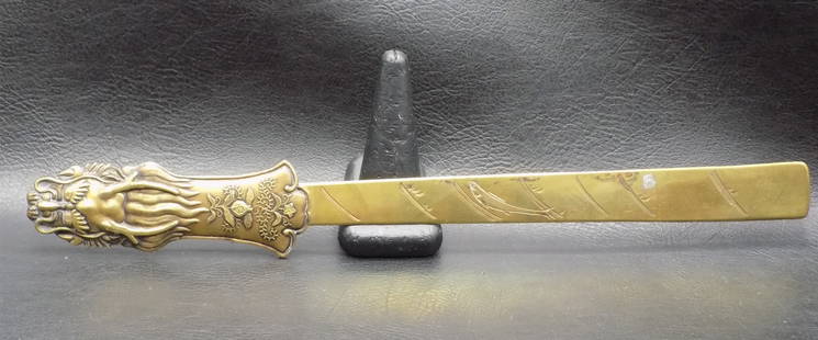 Fancy antique bronze page turner with dragon head: Fancy antique bronze page turner with dragon head. Decorated on both sides. In very good original as found condition. Great quality and detail. 11 &frac34; inches long x 1 &frac12; inches wide. For in