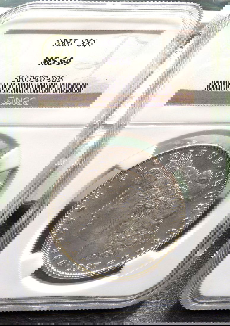 1887 uncirculated MS 64 graded by NGC morgan silver dollar. (1 of 4)