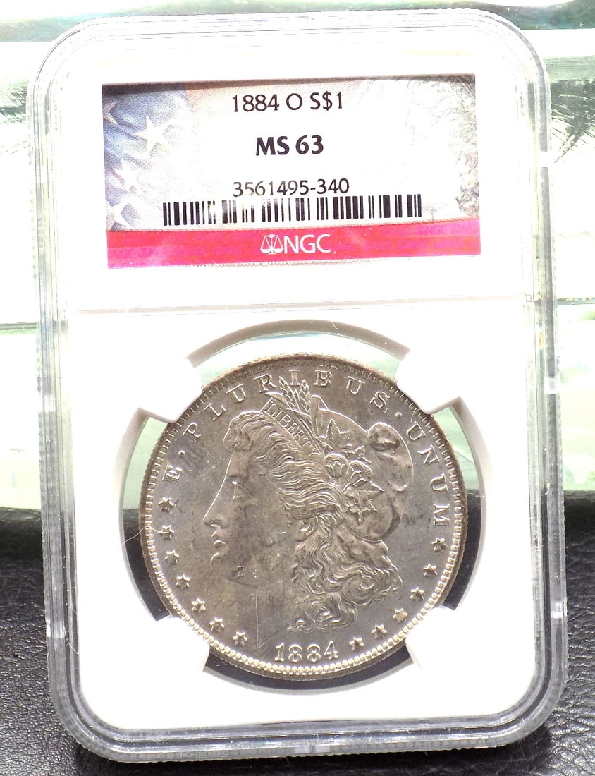 1884 O uncirculated MS 63 graded by NGC Morgan silver dollar (1 of 4)
