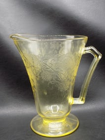 Vintage decorated vaseline art glass pitcher.