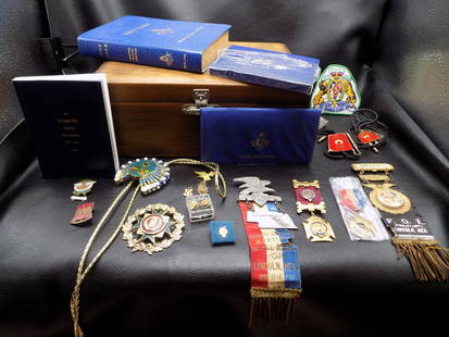 Collection of Grand Lodge Masonic badges, ribbons, patches and books: Collection of Grand Lodge Masonic badges, ribbons, patches and books. In wood box. Please see photos. In very good original as found condition. Great quality and detail. Badge with eagle and