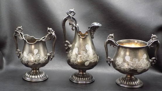 Fancy antique three piece silverplate tea set marked James Tufts: Fancy antique three piece silverplate tea set marked James Tufts. Marked on bottom as shown in photo. With winged dragon and face. In very good original as found condition. Great quality and detail. C