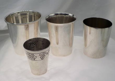 Four vintage sterling silver shot glasses.: Four vintage sterling silver shot glasses. Marked as shown in photo. Various sizes. In very good original as found condition. Great quality and detail. Largest 2 ¼ tall. Total weight 116 grams.