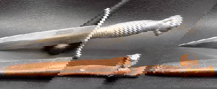 Vintage Gutmann cutlery Solingen German knife with sheath: Vintage Gutmann cutlery Solingen German knife with sheath. Marked on blade as shown in photos. Metal handle with claw and ball end. Leather sheath. In very good original as found condition. Great qual