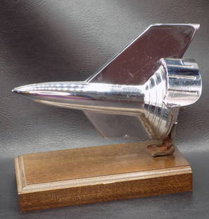 1957 Chevy Rocket Bullet Hood Ornament: 1957 Chevy Rocket Bullet Hood Ornament. In very good original as found condition. Great quality and detail. 6 &frac12; inches long. For in house shipping. Please call Mike at Thriftiques 319-321-0613