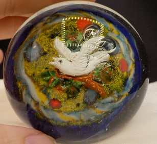Beautiful vintage artist signed paperweight with bird.