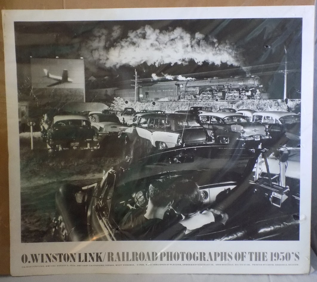 O Winston Link Railroad photographs of the 1950s: O Winston Link Railroad photographs of the 1950s. Showing drive in theater with vintage automobiles. 1956 The Hot Shot East Bound Railroad photograph 1988. Black and white photograph. In very good ori