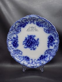 Nicely decorated antique Flow Blue plate with advertising