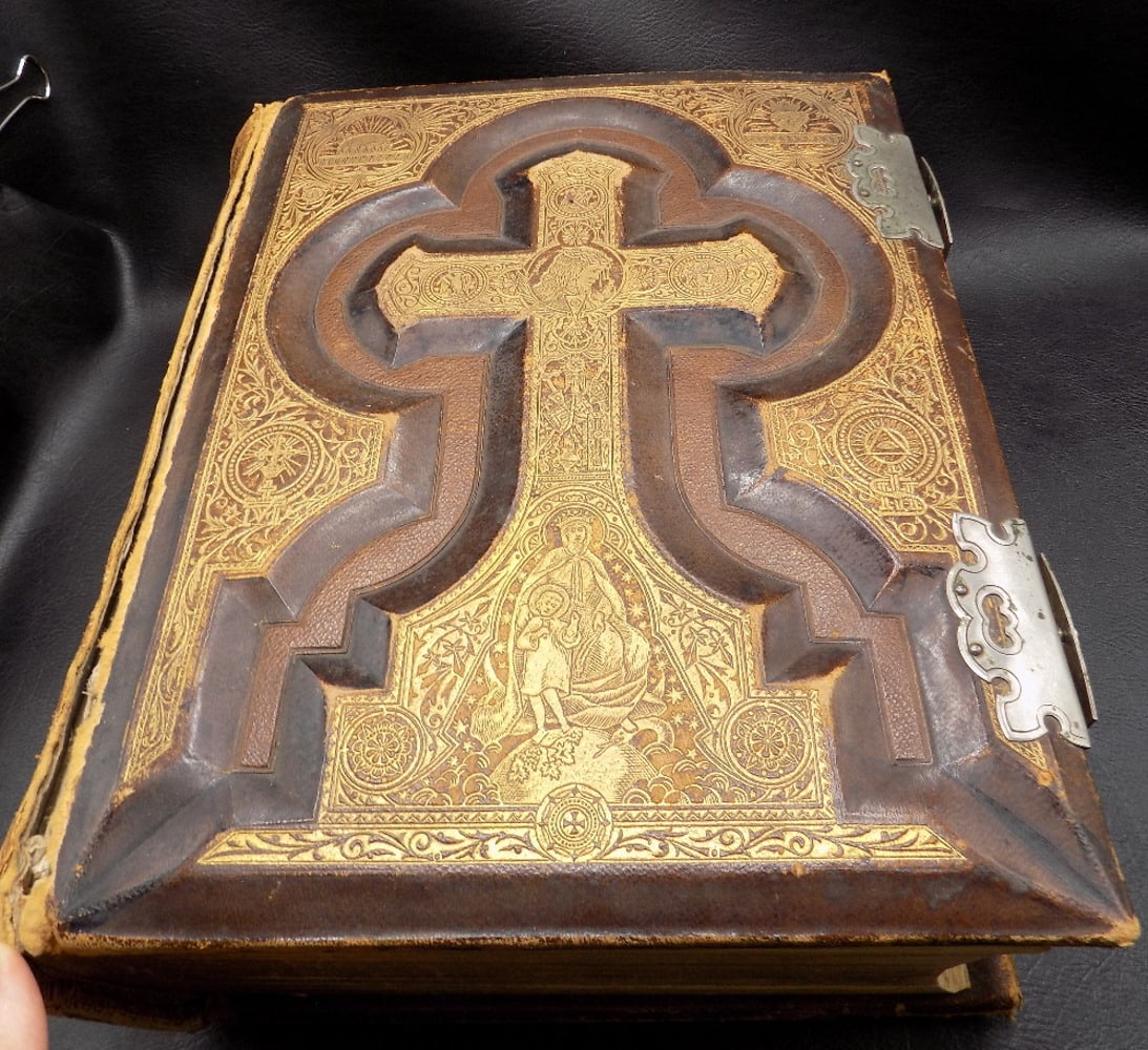 Fabulous large antique 1897 Presentation Bible: Fabulous large antique 1897 Presentation Bible. Heavy gold decoration on front and back cover. Loaded with great steel engravings and pictures. Has place for personal photographs at back of book. Over