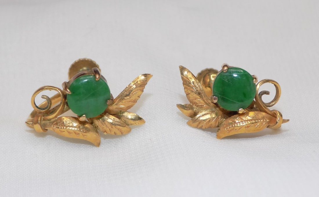 Beautiful 14 k gold and jade earrings: Beautiful 14 k gold and jade earrings. Marked as shown in photo. 3.3 grams. In very good original as found condition. Great quality and detail. For in house shipping. Please call Mike at Thriftiques 3