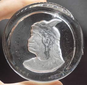 Vintage Sleepy Eye paperweight.