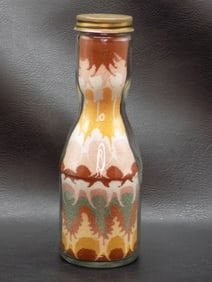 Vintage sand art bottle.