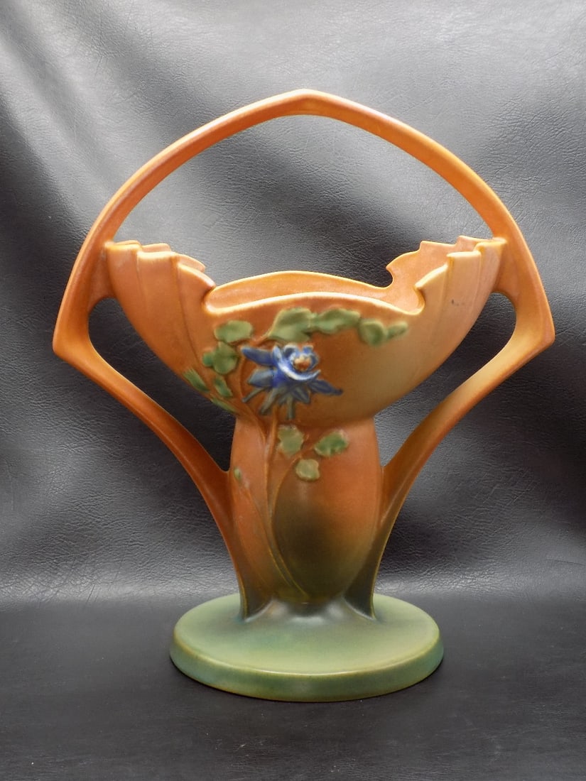 Vintage Roseville Columbine flower art pottery basket or vase: Vintage Roseville Columbine flower art pottery basket or vase. Marked as shown in photo. Beautiful colors. In very good original as found condition. Great quality and detail. 12 ¼ inches tall x